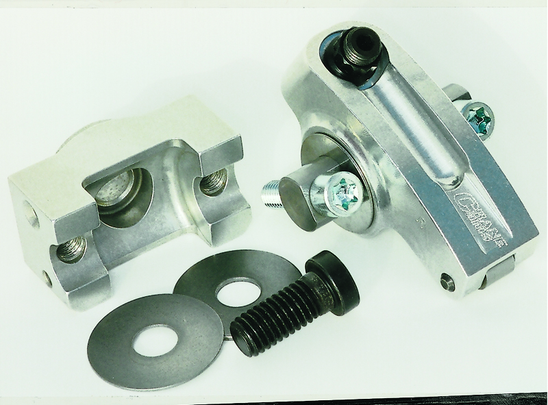 Utilizing a polymer-matrix composite bearing instead of needle bearings provides many advantages, not the least of which is a larger shaft and lighter rocker arm.