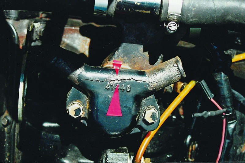 Water froze in this engine, cracking the thermostat housing. Don’t wait too long.